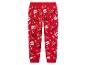 Pantalon de jogging rouge pour enfants avec imprimé Père Noël et rennes.