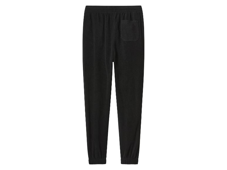 Pantalon de jogging en polaire noir avec taille élastique et poche arrière.