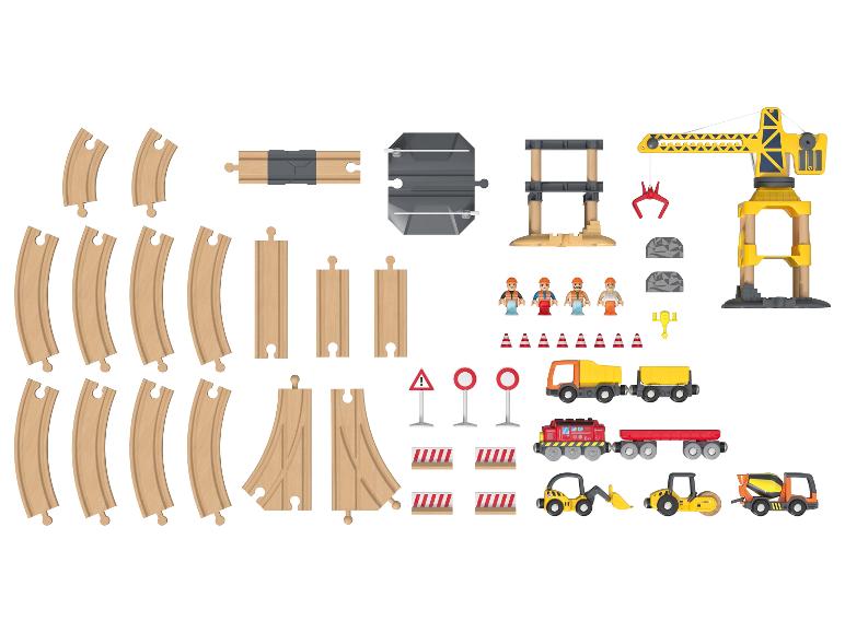 Ensemble de train en bois et véhicules de construction.