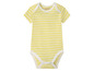 Un body rayé jaune Lupilu pour bébé.