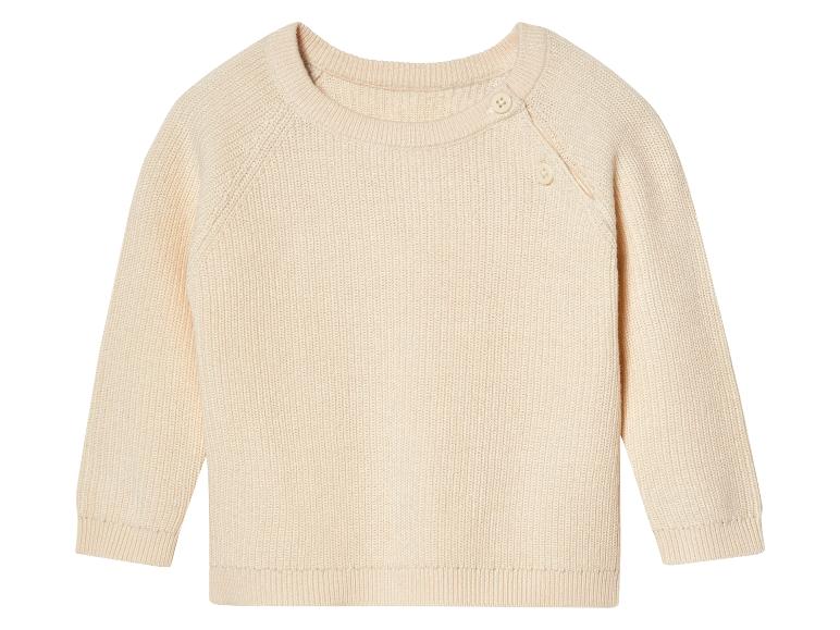 Pull crème en tricot pour bébé avec boutons.