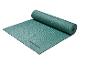 Tapis de yoga ou d'exercice vert, partiellement roulé.