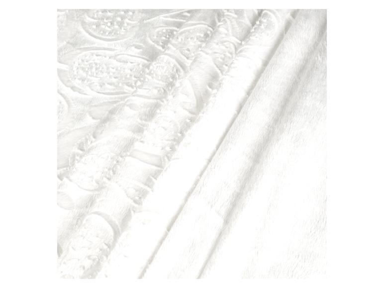 Tissu en peluche blanc avec un motif paisley.