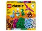 Boîte LEGO Classic Creative Dinosaurs de 450 pièces, présentant des dinosaures construits et des briques colorées.