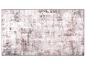 Tapis dans les tons gris et rose avec un motif abstrait.