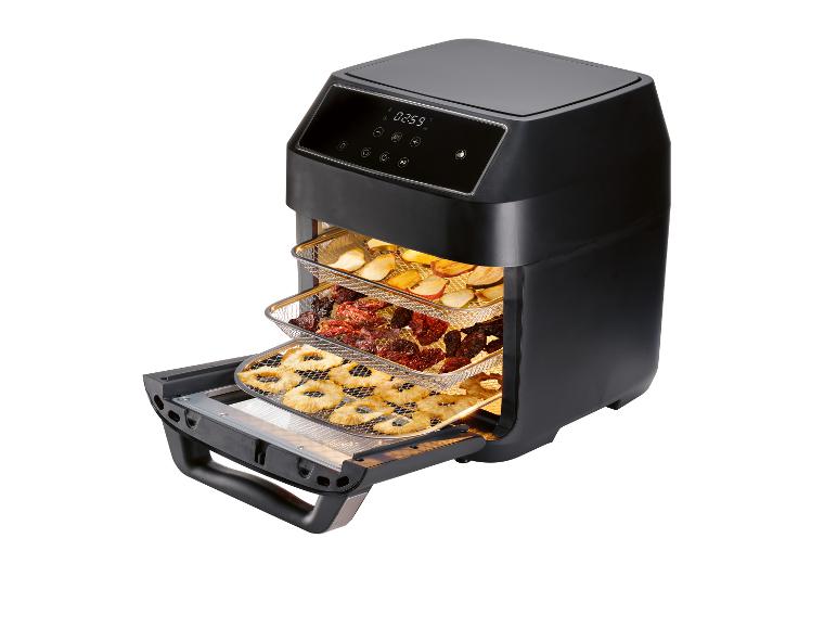 Friteuse à air avec déshydrateur de fruits et légumes, avec ananas, tomates séchées et pommes.