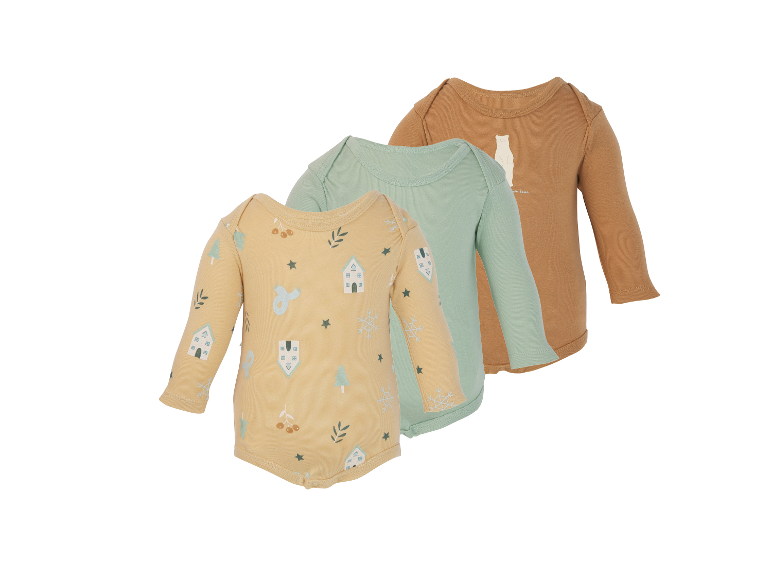 Trois bodys bébé à manches longues : un jaune à motifs hivernaux, un vert menthe et un marron avec un ours polaire.
