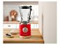 Blender rouge vintage 1973 dans une cuisine avec du yaourt et des myrtilles.