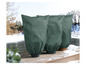 Trois housses de protection vertes pour plantes en hiver, sur une terrasse en bois.