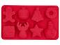 Moule de cuisson en silicone rouge avec huit cavités sur le thème de Noël.