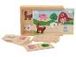 Dominos en bois avec des images d'animaux de la ferme, y compris un cochon, un cheval et un mouton.