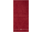 Serviette rouge avec une ligne blanche et une broderie de nœud.