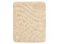 Un tapis de bain moelleux de couleur crème avec un motif ondulé.