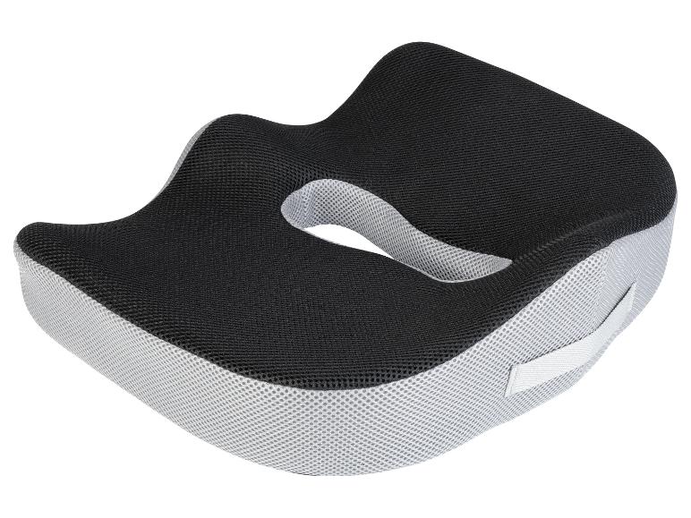 Coussin ergonomique noir et gris pour chaise.