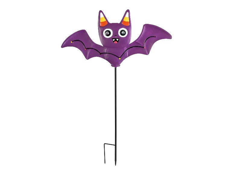 Piquet de jardin chauve-souris violet avec yeux lumineux et oreilles en bonbon de maïs, pour Halloween.