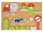 Un tableau de jeu en bois avec un camion, une moto, une maison et un arbre