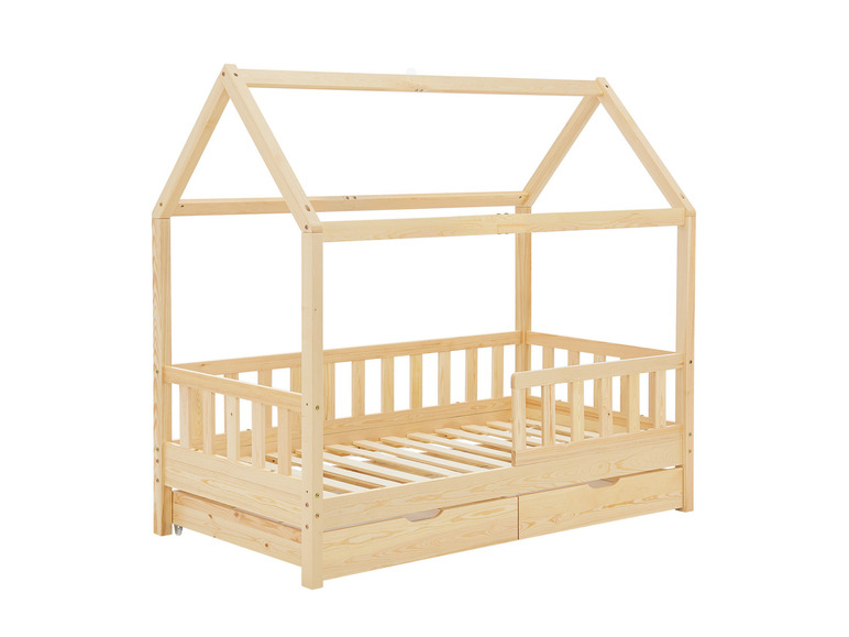 Un lit d'enfant en bois avec un auvent en forme de maison et deux tiroirs.
