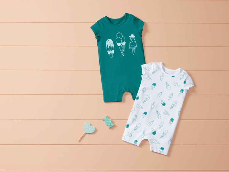 Deux bodys bébé avec un motif de glaces