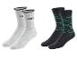 Deux paires de chaussettes Parkside : une paire grise avec des lettres noires et une paire noire avec des lettres vertes.