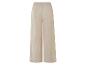 Pantalon large beige en tissu texturé.
