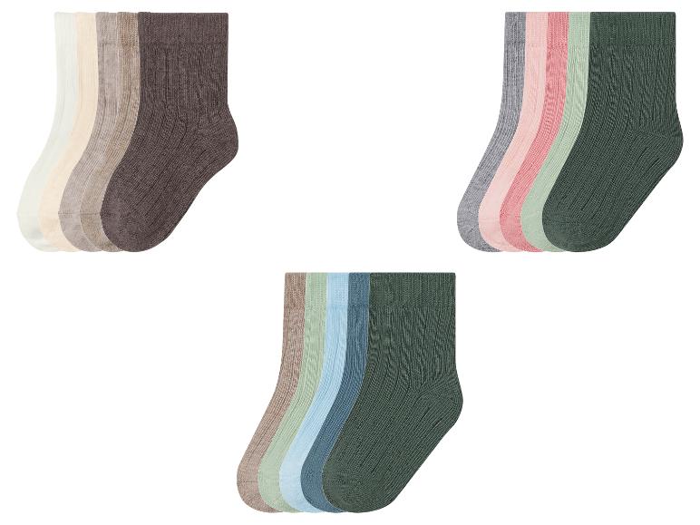 Trois lots de cinq paires de chaussettes côtelées dans des tons terreux et pastel variés.