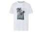 T-shirt blanc avec imprimé palmier et texte 'TROPICAL SUMMER'.