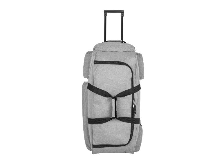 Sac de voyage gris à roulettes, idéal pour les déplacements.