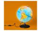 Globe lumineux avec les continents nord et sud-américains visibles, sur fond orange.