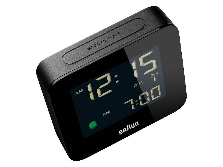 Réveil numérique noir avec écran affichant l'heure 12:15 et l'alarme 7:00 AM