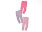 Deux leggings roses et un legging violet sur un fond blanc.