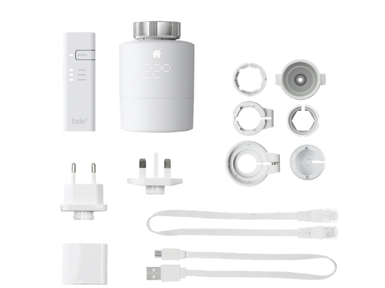 Système de thermostat intelligent Tado° avec unité centrale, capteur de température et accessoires.