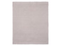 Une couverture en tricot gris clair