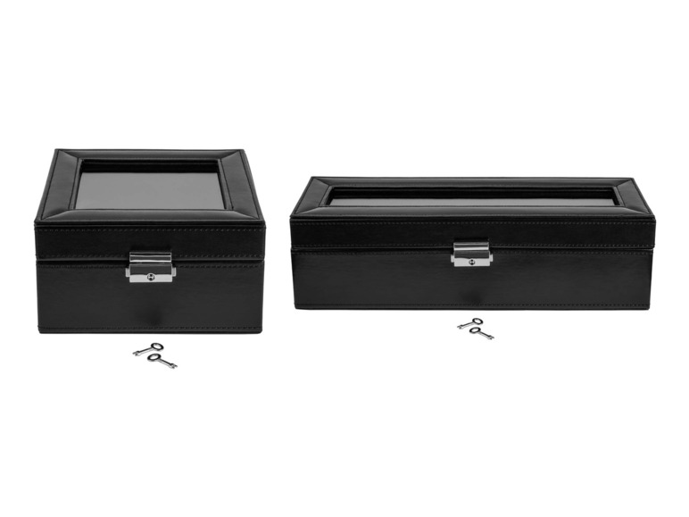 Deux boîtes à montres en cuir noir avec couvercle en verre et clés