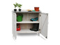 Une armoire en bois blanche avec des outils de jardinage, des plantes et des bottes.