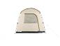 Tente de camping beige et verte avec fenêtre.