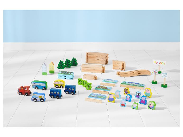 Ensemble de jeu en bois Peppa Pig avec train, bus, rails et figurines.