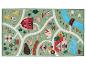 Tapis de jeu sur le thème de la ferme, avec routes, grange, animaux et maisons.