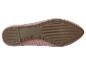 Semelles de chaussures rose pâle en tissu tricoté.
