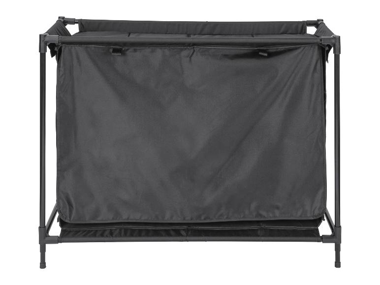 Panier à linge pliable avec tissu noir et cadre métallique.