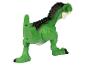 Un jouet de dinosaure T-Rex en plastique vert