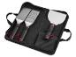 Ensemble de trois spatules de barbecue dans une pochette noire zippée.