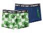 Deux paires de boxers pour garçons, l'un à carreaux verts et blancs avec des visages de creeper, l'autre bleu avec des motifs de creeper.