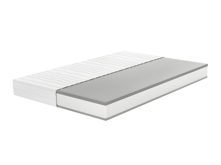 Un matelas blanc avec une bordure grise