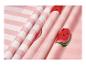 Tissu rose rayé et à motifs de pastèques, idéal pour la literie ou les vêtements d'été.
