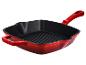 Poêle à griller en fonte rouge avec intérieur noir et surface de cuisson nervurée