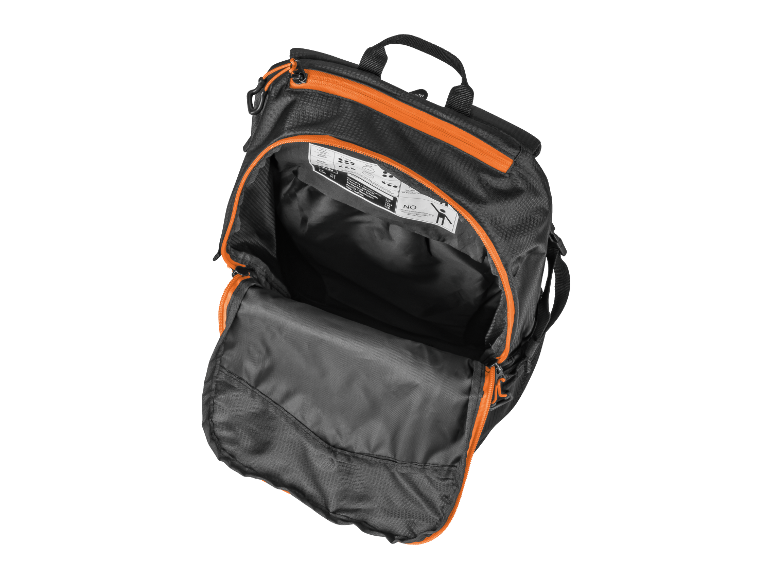 Sac à dos noir avec des détails orange ouvert, montrant son intérieur.