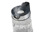 Bouilloire en verre avec de l'eau bouillante et de la vapeur s'échappant du couvercle.