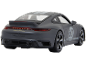 Voiture de sport miniature grise avec le numéro 60 sur le côté.