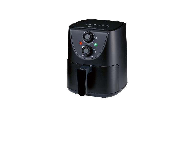 Une friteuse à air noire avec des boutons pour régler le temps et la température.
