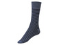 Une paire de chaussettes bleues avec des rayures noires.